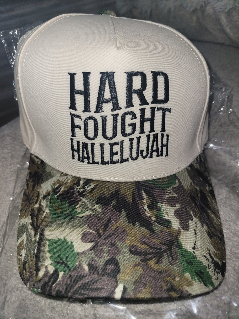 Hard Fought Hallelujah Embroidered Trucker Hat - Cream & Camo